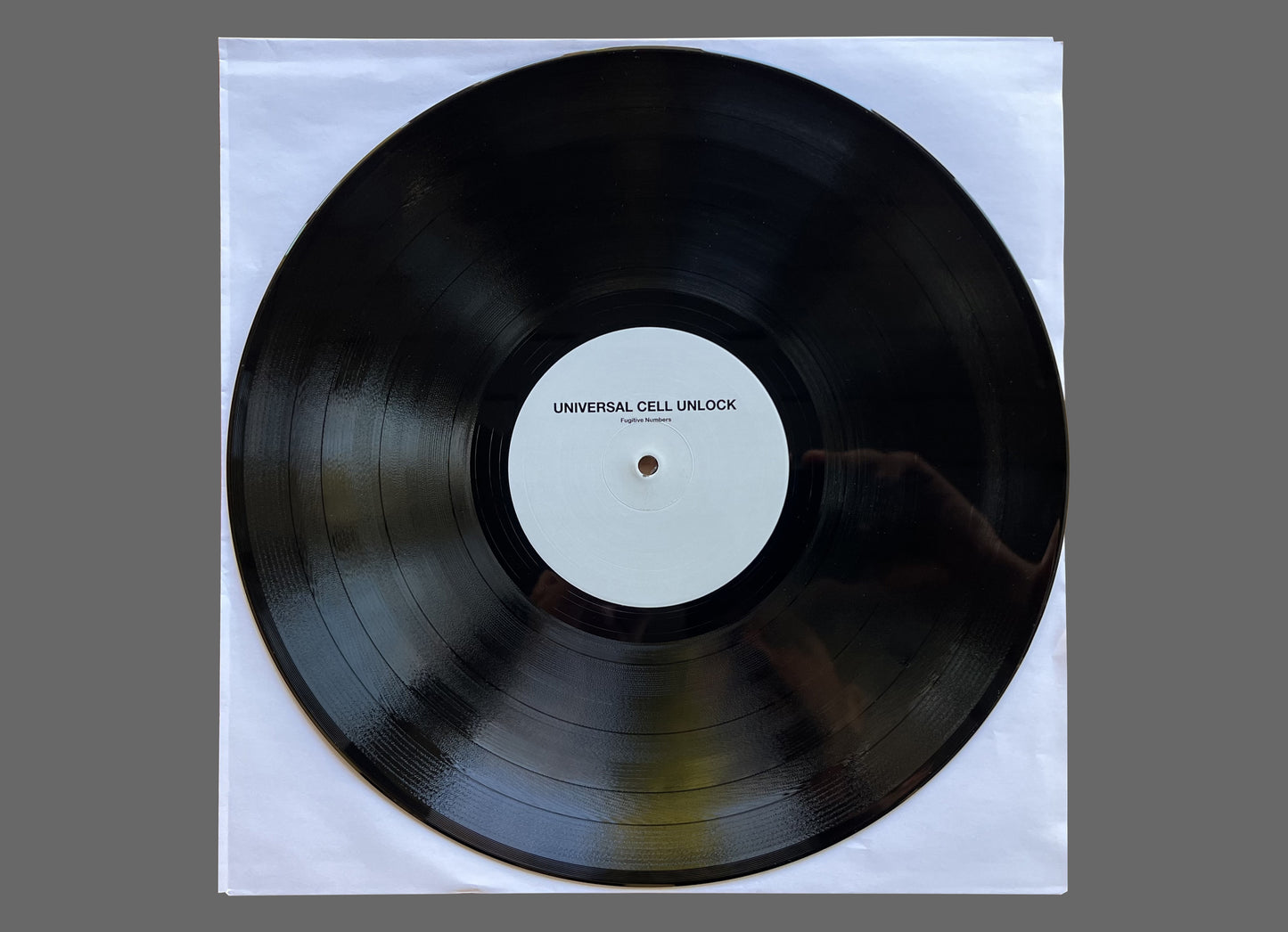 Universal Cell Unlock - Fugitive Numbers 12” (PSR032)